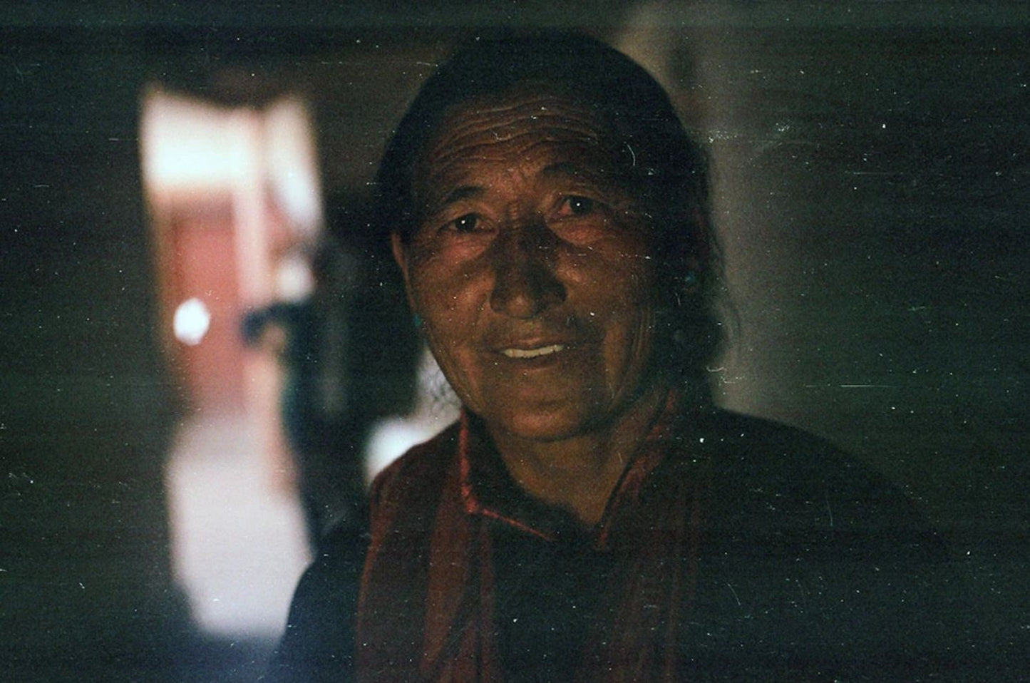 'A welcoming old woman at Nymo village' - Aman Chotani original print