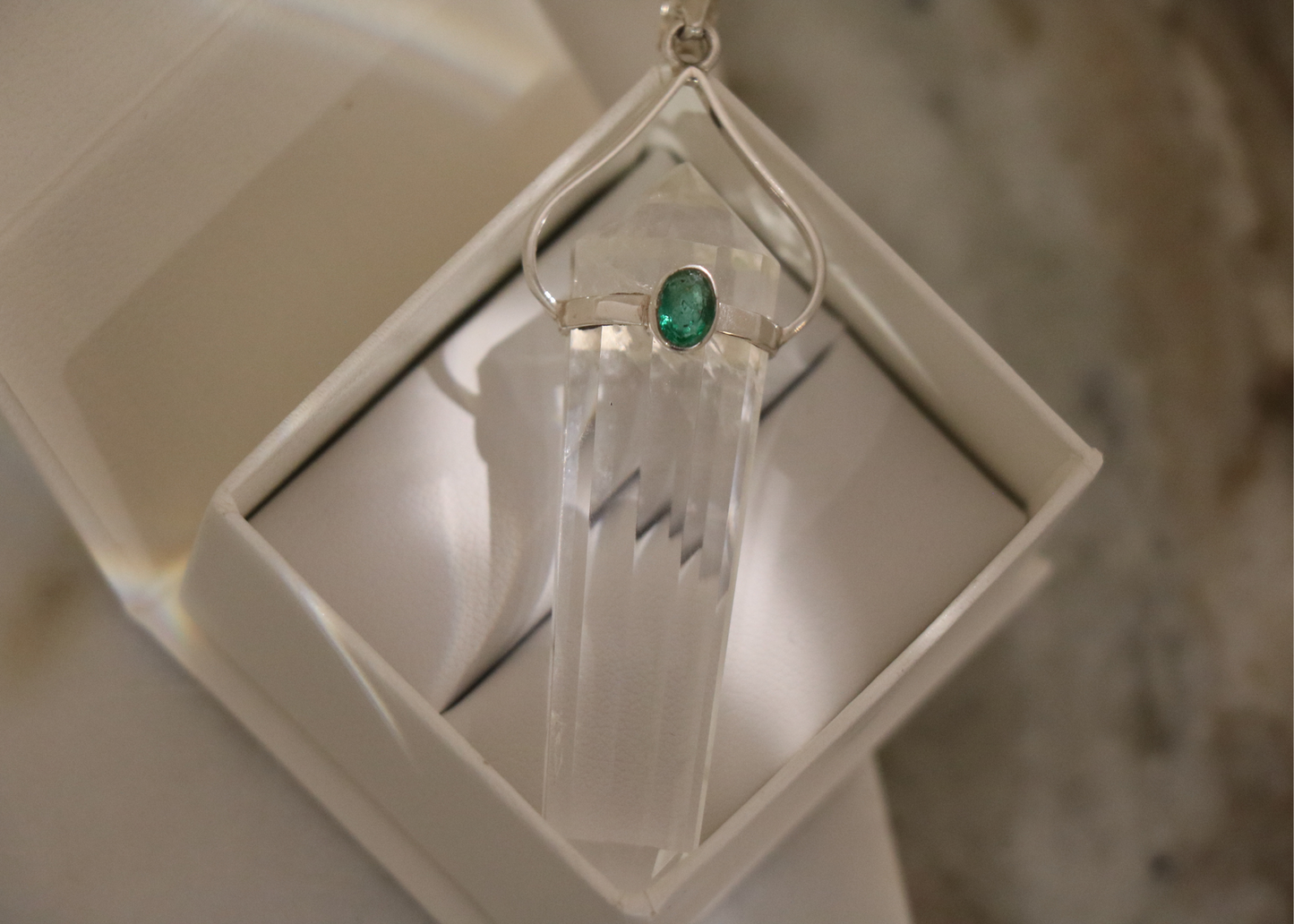 Clear Quartz Crystal with Emerald Pendant