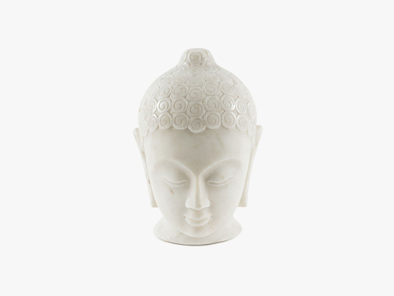White marble Buddha head